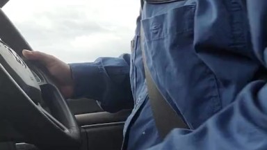 Blue collar worker jerks driving to work