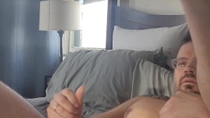 Jerking off while using a dildo
