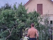 After a hot day, I water the garden 12/16