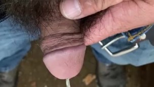 Little dick pissing in the rain
