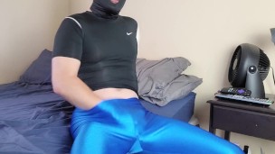 Spandex boy masturbating and cumming on shiny leggings