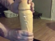 Milf oiling up thick dildo