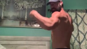 Muscular man doing his chores 