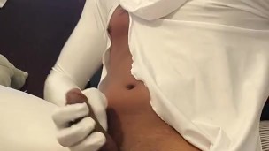 KennieJai plays in white spandex suit