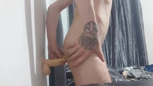 Super skinny horny teen oils his open gape anus ass and dildo up and rides it hard balls deep hot
