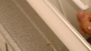 Horny on the plane and went to jerk off in the toilet