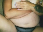 She smokes a cigarette and plays with her breasts 12/16