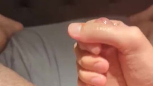 Huge sticky cumshot and cum play with hand.