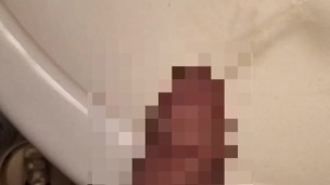 Hairy Japanese men pees foreskin with erect penis.