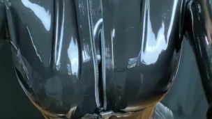 Latex slave polishes my catsuit