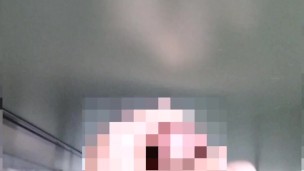 A hairy Japanese man masturbates in the bathroom. His semen splashed on the door.