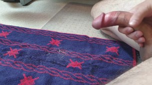 Spraying a huge load of cum from hard curved cock