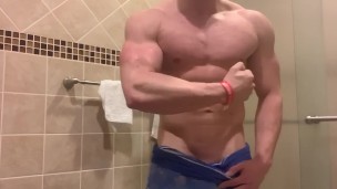 Jacked Alpha Male Flexes in Just Towel