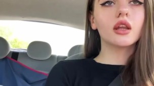 She shows her tits right behind the wheel of a car