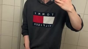 Twink jerks off in Public toilet