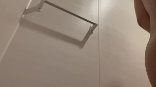 Chubby Japanese man inserts wall-mounted dildo into anus