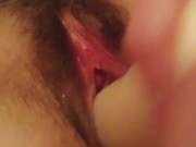 Fucking my hairy pussy with a thick dildo. Pussy very juicy and wet