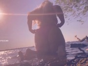 Bikini butt teasing in the water at a public beach!  1/16