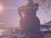 Bikini butt teasing in the water at a public beach!  6/16