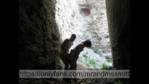 Russian brunette publicly sucks a stranger in a fortress and gets her pussy fucked