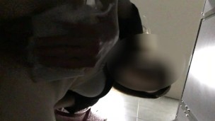 Piss from a hairy cunt in a public toilet