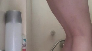 Rosie pleasures herself in the shower while husband is away