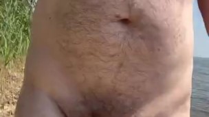 Hairy Dad Bod Bouncing Along the Nude Beach