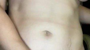 Stretches pussy sitting in a chair and shows a big clitoris