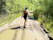 sexy blonde pissing in a puddle on the road 14/16