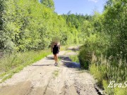 sexy blonde pissing in a puddle on the road 2/16