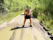 sexy blonde pissing in a puddle on the road 4/16