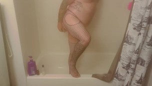 Caged fag bou plays with toys in the shower 