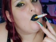 Nicki Pie smoking and masturbating in black