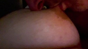 Playing and sucking massive DDD natural tits