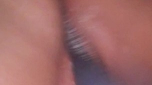 Young latina playing on snapchat