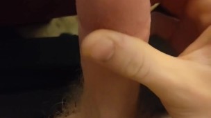 thick cum dripping down a big cock