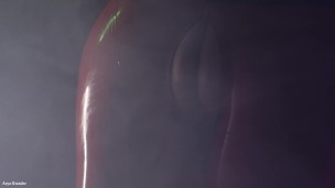 sexual pin up fetish model slowly teasing in oily shiny sex costume - halloween video