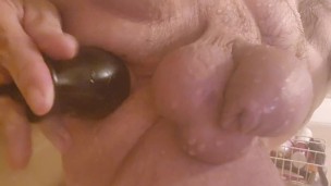 Stretching my cunt with my inflatable plug in the shower.