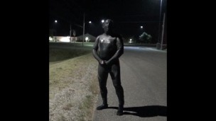doubled cocked masked wetsuited guy jerking off outside