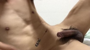 Sexy Asian jerks with all her might while masturbating