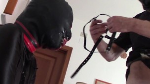 I put my wife on her knees, hooded and gagged. Cummed on her mouth with a huge load of cum