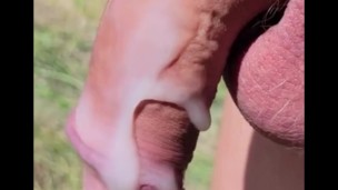SLOW MOTION johnholmesjunior dripping huge cumload on nude beach in slow motion