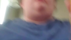 Fat male testing throat with banana