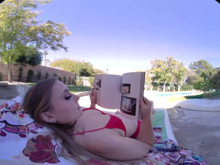 Busty blonde rides a hard cock poolside in VR