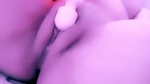 Pregnant milf toying with her pussy
