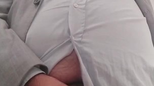 Cumshot in the office in a suit and tie