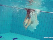 Lonely but energetic teen Nina swims naked 14/16