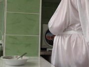 Mature MILF housewife with big natural tits is in the kitchen cooking scrambled eggs. 14/16