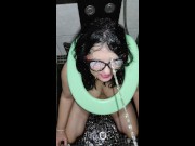Bad ass plays a human toilet with toilet seats ower her neck. 2/16