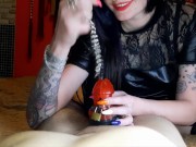 Dominatrix plays with slave's dick in chastity belt 7/16